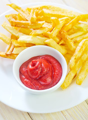 Canvas Print - potato fries with sauce