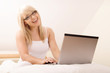 © Sławomir Fajer - Young woman browsing internet. Selective focus