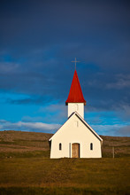 Typical Rural Icelandic Church Under A Blue Summer Sky