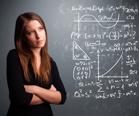 beautiful school girl thinking about complex mathematical signs