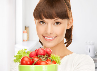 Poster - woman in the kitchen with tomatoes