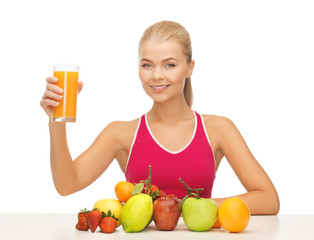 Canvas Print - young woman with glass of orange juice