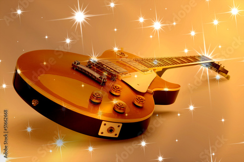 Board z aluminiowym obramowaniem Gitara elektryczna przed gwiazdowym tłem