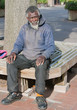Poor old African american homeless man