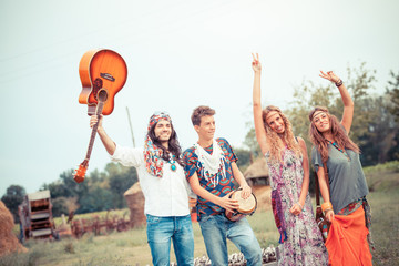 Wall Mural - Hippie Group Playing Music and Dancing Outside