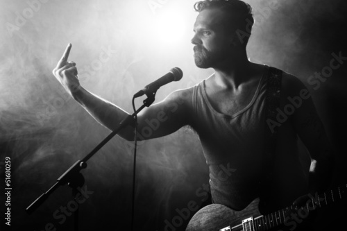 Fényképezés  Rocker with Attitude Gives Finger