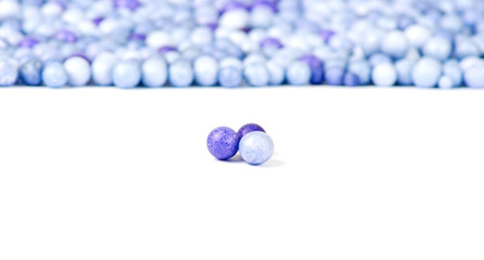 One blue and two violet little pearls