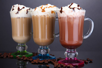 Poster - Layered coffee in glass on table on grey background