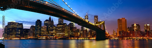 Obraz w ramie Manhattan panorama with Brooklyn Bridge at sunset in New York