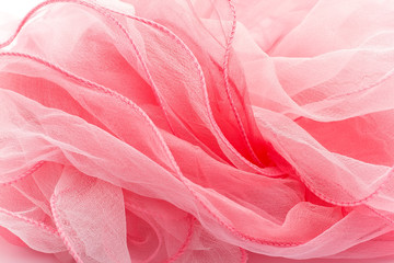 Pink silk scarf.