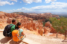 Hikers In Bryce Canyon Resting Enjoying View