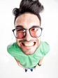 © matusciac - funny handsome man with hipster glasses smiling  - wide angle
