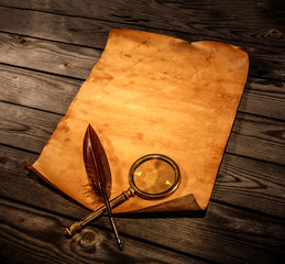 Blank old paper against the background of an aged wood