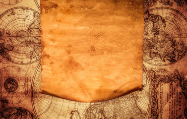 blank old paper against the background of an ancient map