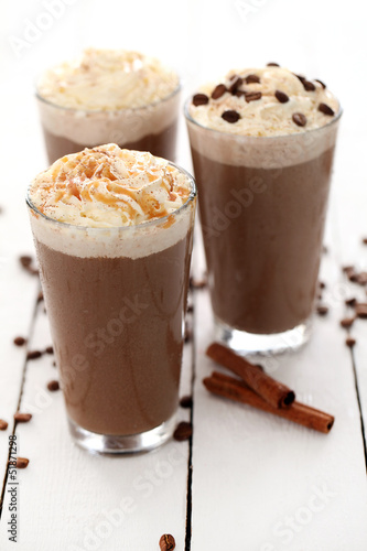 Fototapeta na wymiar Ice coffee with whipped cream