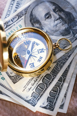Wall Mural - Golden vintage compass and money