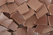 Chocolate pieces or chips texture background