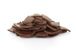 Chocolate pieces heap on white, clipping path