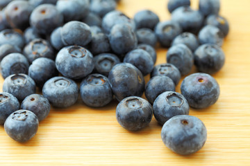 Poster - Blueberry on wooden background