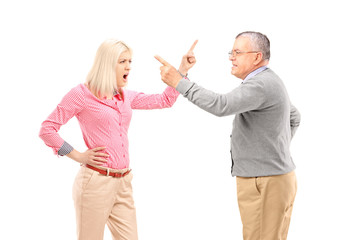 Canvas Print - An agry female and mature man arguing