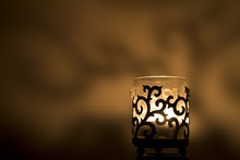 Jar Candle Holder On A Golden Background