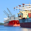cargo ships loading in cargo terminal