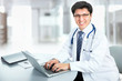 © chagin - Medical doctor working with laptop