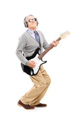 Sticker - full length portrait of a mature man playing guitar