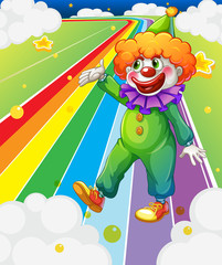 Wall Mural - A clown standing in the colorful road