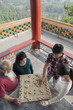 © xixinxing - Chinese Family Playing Chinese Chess (Xiang Qi)