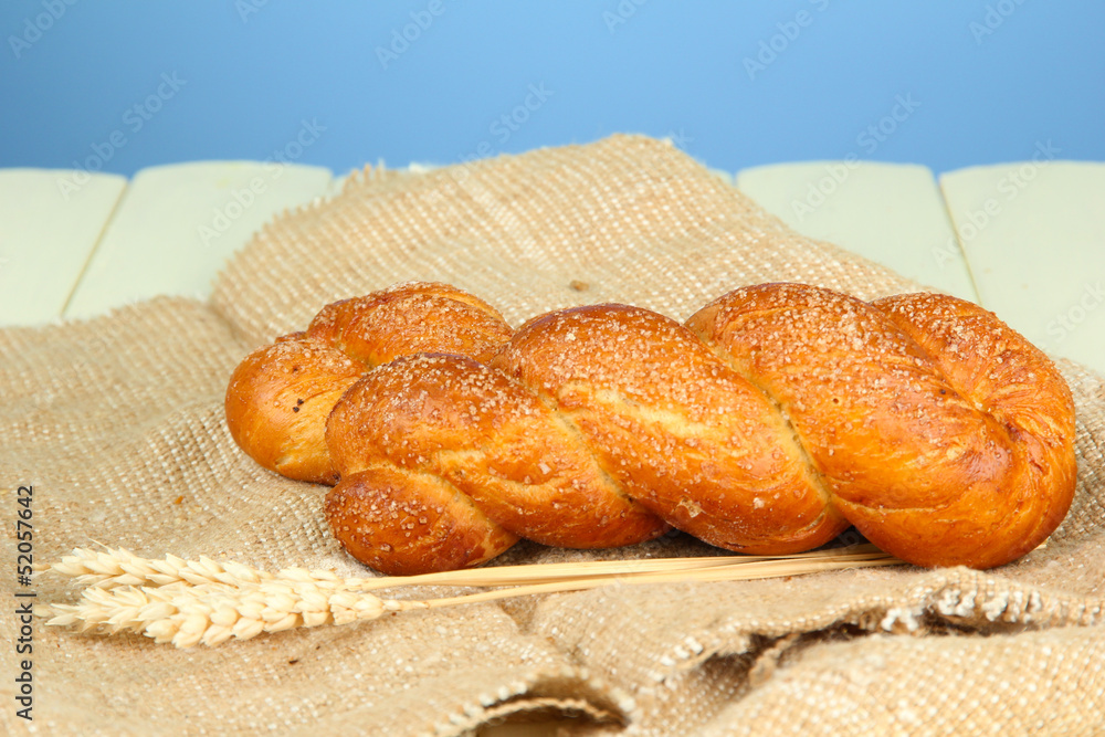 Composition with buns in wicker basket,