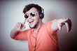 © Eugenio Marongiu - Stylish man listening to music