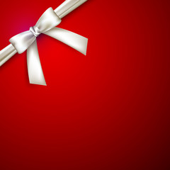 Wall Mural - red background with white bow