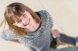© Krakenimages.com - Happy Woman Holding Skateboard