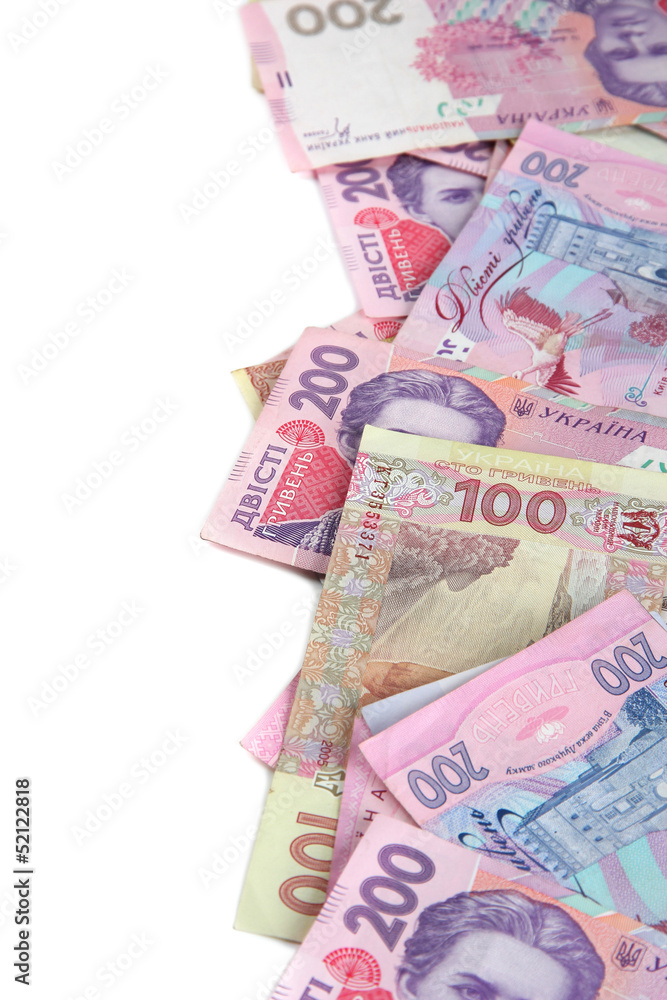 Pile of Ukrainian money, isolated on white