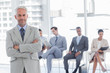 © WavebreakmediaMicro - Serious businessman standing in a waiting room