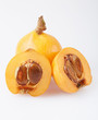 Loquat and section on white, clipping path included