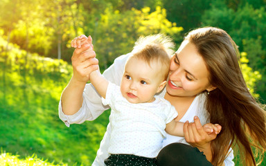 Fototapete - Beautiful Mother And Baby outdoors. Nature