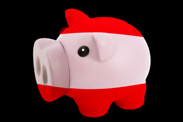 piggy rich bank in colors national flag of austria   for saving