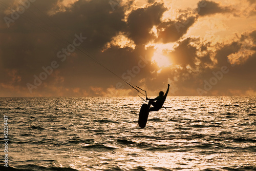 Obraz na płótnie canvas dwuczęściowy "dyptyk" Kite surfer skoki z wody