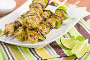 Wall Mural - Lime, Mint & Coriander Chicken Kebabs. Barbeque food!