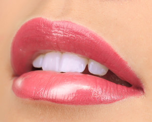 Beautiful make up of glamour pink gloss lips