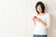 © taka - beautiful asian woman using smart phone