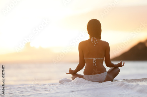 Obraz w ramie Meditation - Yoga woman meditating at beach sunset