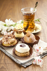 Wall Mural - Different sort of beautiful pastry, small colorful sweet cakes w