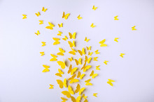 Paper Yellow Butterflies Fly On Wall In Different Directions