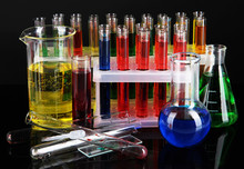 Colorful Test Tubes On Dark Background
