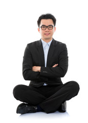 Canvas Print - Asian business man sitting on floor