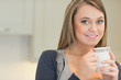 © WavebreakmediaMicro - Happy woman drinking coffee
