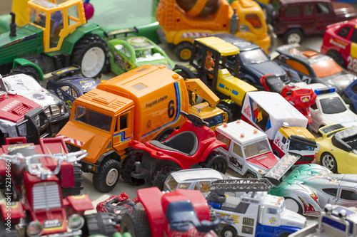 Naklejka na meble tons of plastic toys and cars